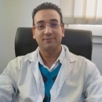 الدكتور غانم كريد أخصائي الأمراض الرئوية